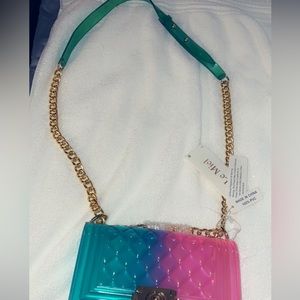 Brand new pink and teal purse.